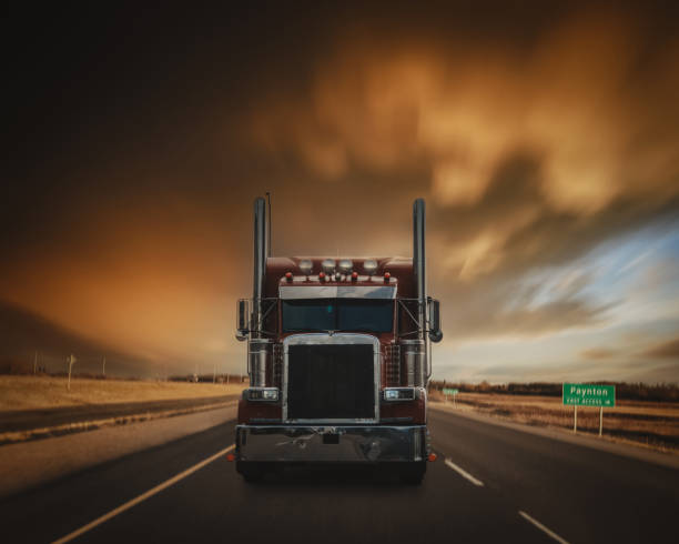 red chromed semi truck driving on a highway near paynton, saskatchewan - semi truck fotos imagens e fotografias de stock