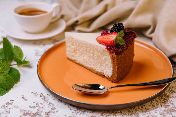 istock Piece of cheesecake and coffee cup 1425436574