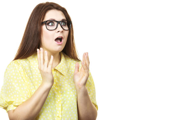 istock Shocked amazed woman gesturing with hands 1425437111