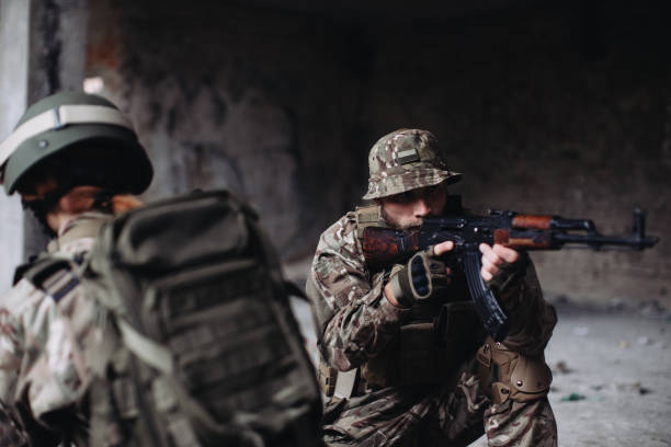 istock Fully equipped and armed soldiers 1425441211