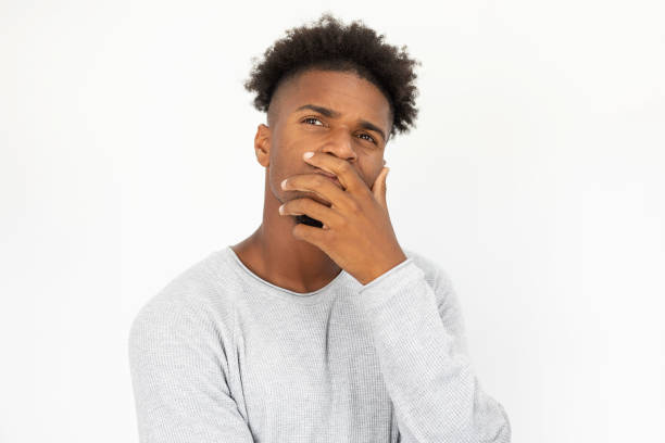 istock Portrait of doubtful African American man thinking 1425448428