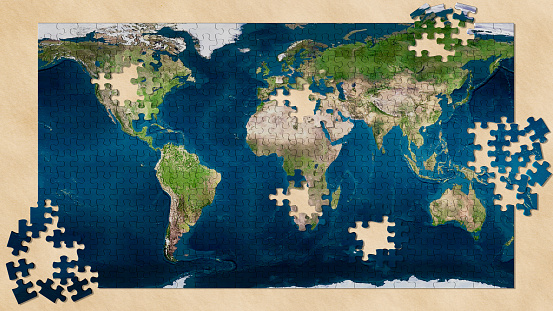3d illustration. Elements of the Puzzle make up the world map. The flat geographical map of our planet is progressively formed until completion.