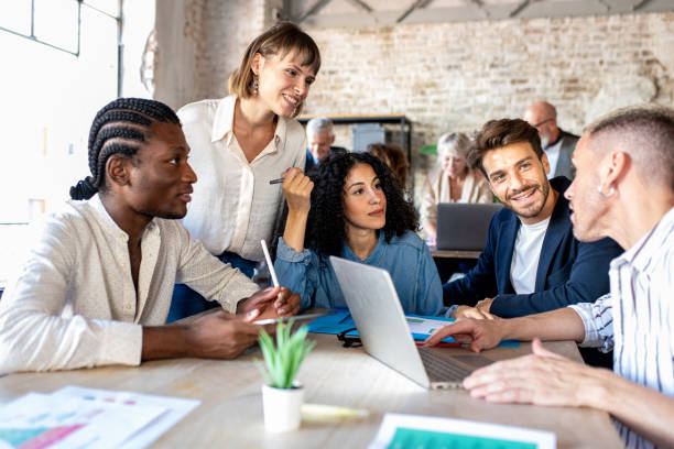 istock Young creative designer people working together and planning strategy, happy and successful teamwork 1425459983