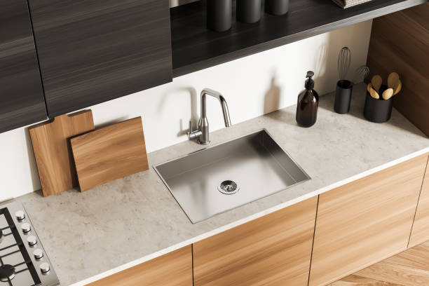 istock Top view of stylish kitchen interior with sink and kitchenware on deck 1425463425