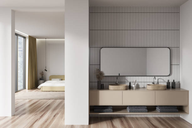 istock Light studio interior with sink and bed near window with city view 1425463818
