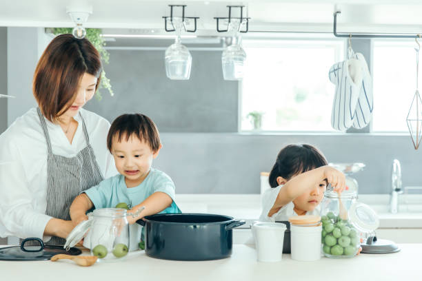 istock Parent and child cooking in the kitchen 1425465904