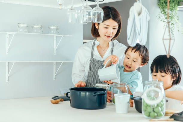 istock Parent and child cooking in the kitchen 1425465940