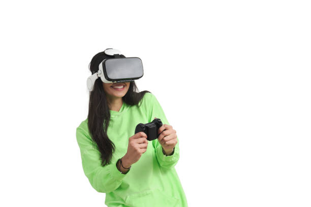 istock Happy Venezuelan woman playing VR game, isolated. 1425467330