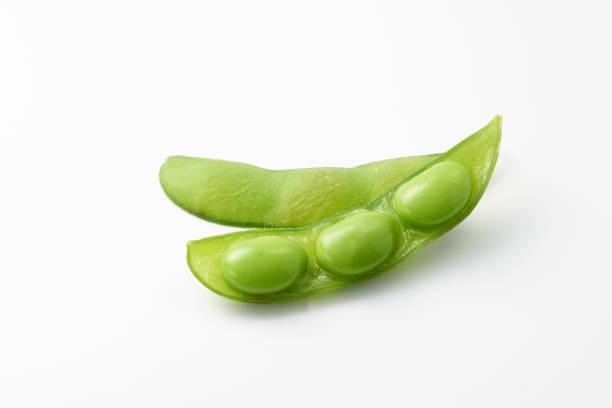 green soybeans fruit on white background green soybeans fruit on white background pod stock pictures, royalty-free photos & images