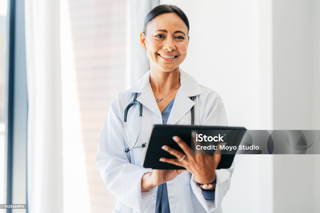 Telehealth doctor woman, connect digital tablet and virtual healthcare analysis, medical service and planning online. Happy portrait of wellness worker, medicine research and clinic internet results Doctor Stock Photo