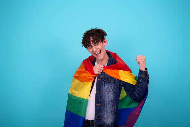 istock Young attractive guy with a rainbow flag. 1425472827