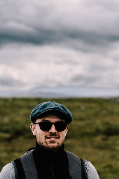 istock Happy hiker smiling. Footpath in Scotland. 1425475368