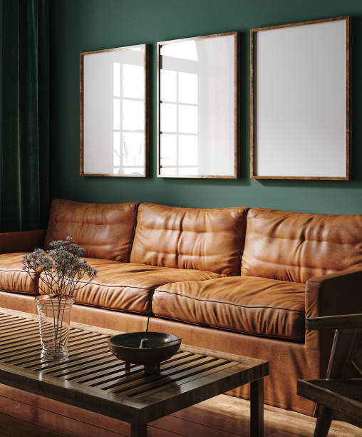 istock Three vertical wooden frame mockup in dark green home interior with brown leather sofa and decor 1425479161