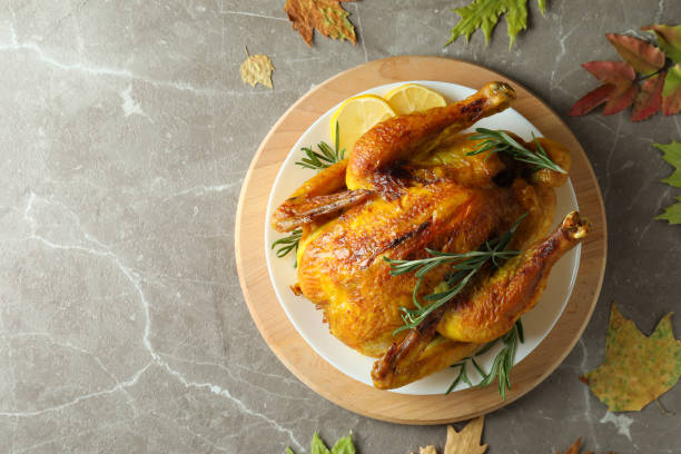 istock Thanksgiving Day roast turkey on gray textured table 1425480847