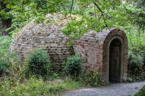 istock Victorian Ice House - constructed in brickwork with deep hole inside where food was packed amongst large volumes of ice to keep them fresh 1425483566