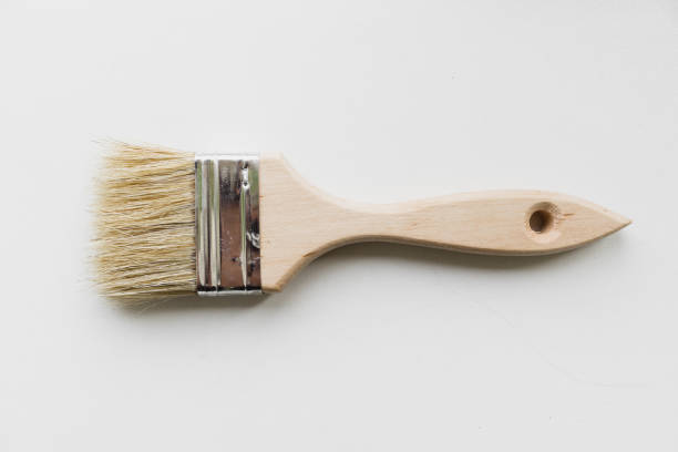 istock Paint brush with wooden handle new on white background. 1425484186