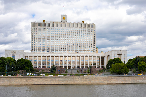 Moscow, Russia - June 15, 2022: House of the Government of the Russian Federation on Krasnopresnenskaya embankment. Administrative building on the banks of the Moscow River