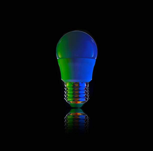 istock led colored light bulb on a dark background. close-up. 1425491736