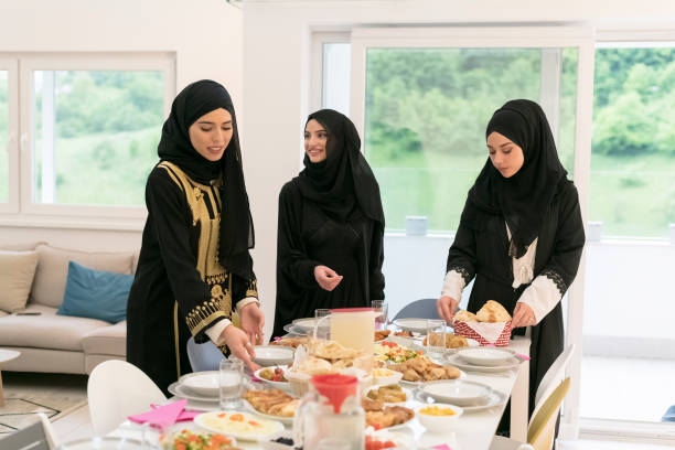 istock Young muslim women preparing food for iftar during Ramadan 1425500090
