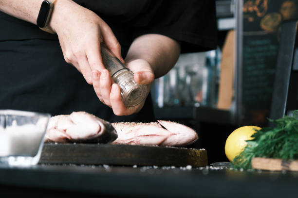 istock Preparing fresh sea bream for frying 1425500908