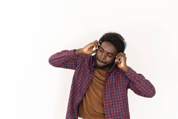 istock Happy man listening to music 1425505565