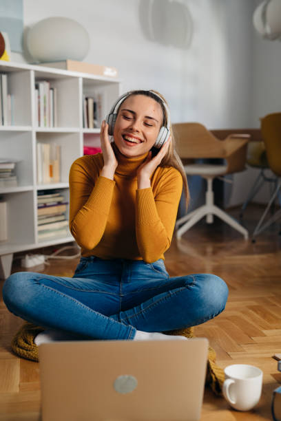 istock woman using laptop at home 1425509840