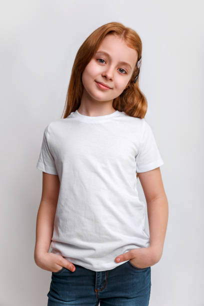 istock Kid in white t-shirt and jeans in studio 1425513190