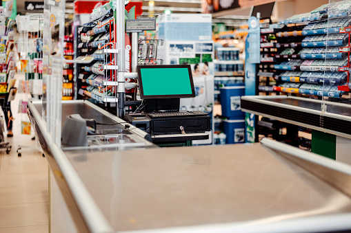 Supermarket cashier checkout work place