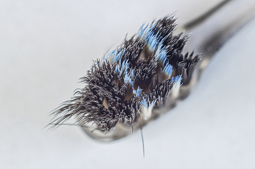 Close-up of old toothbrush, brush bristles