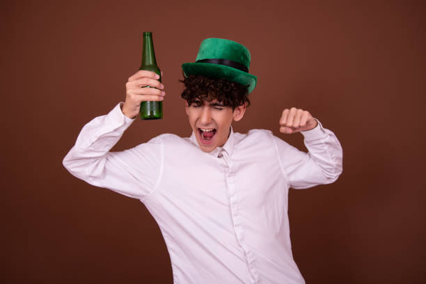 istock Funny guy with a green bottle 1425515610