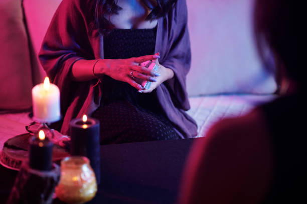 istock Seer Shuffeling Tarot Cards 1425524642