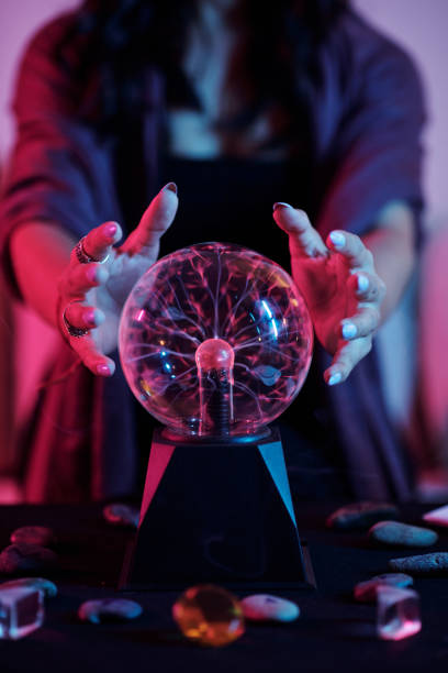 istock Fortune Teller Gazing into Crystal Ball 1425524685