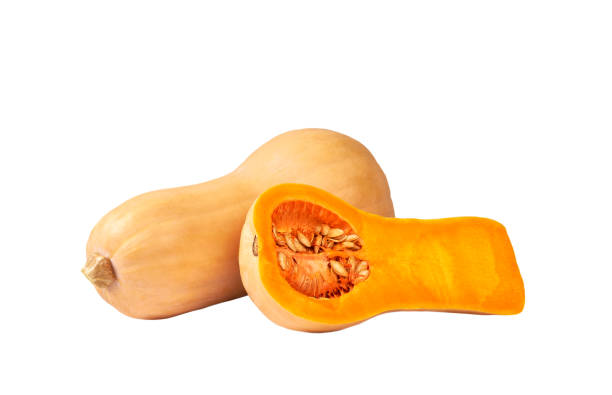 istock whole and half ripe butternut squash isolated on white background. 1425528202