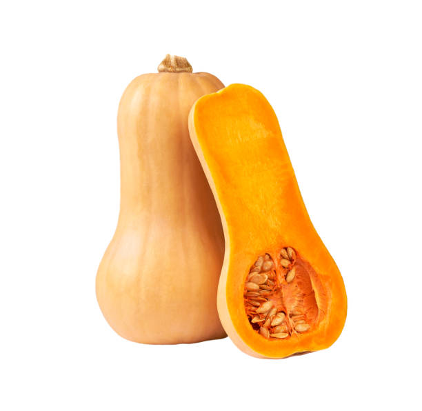 istock whole and half fresh butternut squash isolated on white background. 1425528240