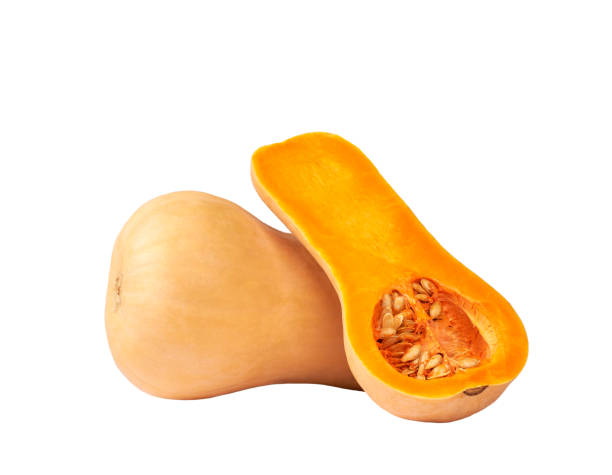 istock whole and half butternut squash isolated on white background. 1425528245
