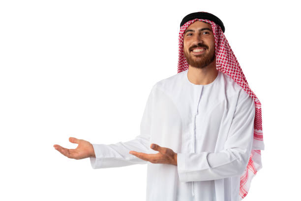 istock Young Arab man pointing hand isolated on white background 1425529475