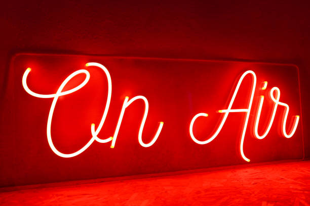 istock Red neon sign on air. Trendy style. 1425530080
