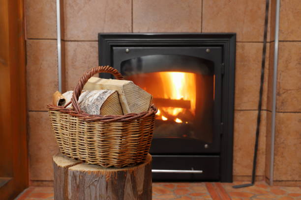 istock A wicker basket of birch firewood at fireplace. 1425530387