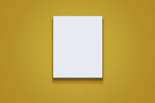 istock White clean paper sheet lying on yellow surface 1425532088