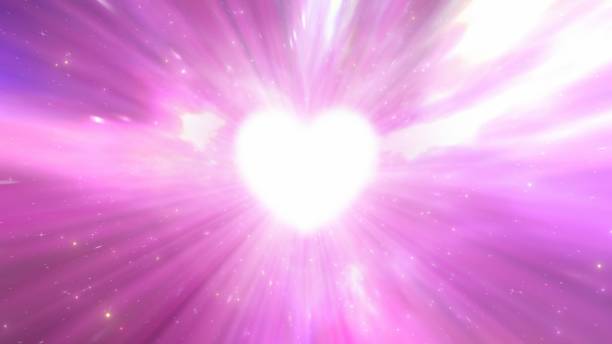 istock Love Heart Shape Light Speed Fast Moving Outer Space Wormhole Tunnel - Abstract Background Texture 1425535295