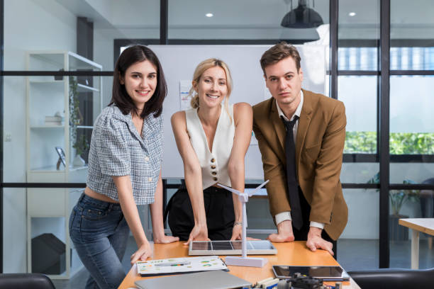 istock Business person meeting on solar cell panel technology. Business People Discussing Solar Power Environment Concept 1425540701