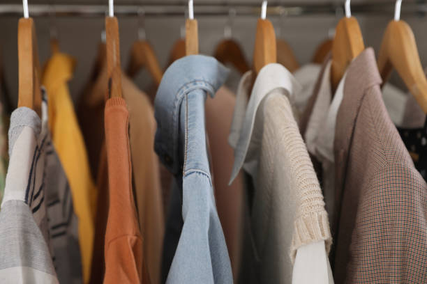 istock Wardrobe closet with different stylish clothes, closeup 1425543115