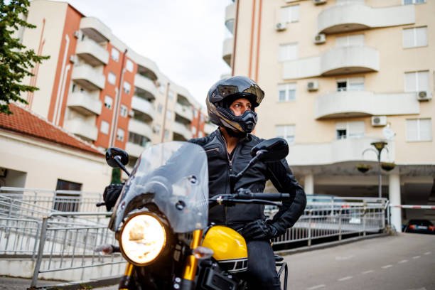 istock Motorcyclist joins the traffic 1425544294