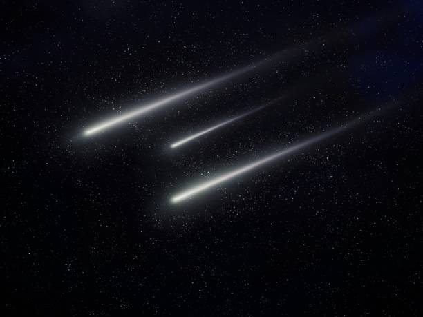istock Meteor trails in the night sky, beautiful meteor shower. falling stars. 1425546182