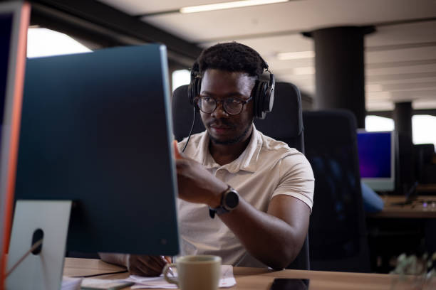 istock White collar worker sitting in his office 1425547044