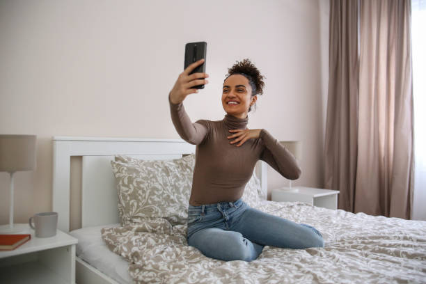 istock Young woman taking a selfie 1425552626