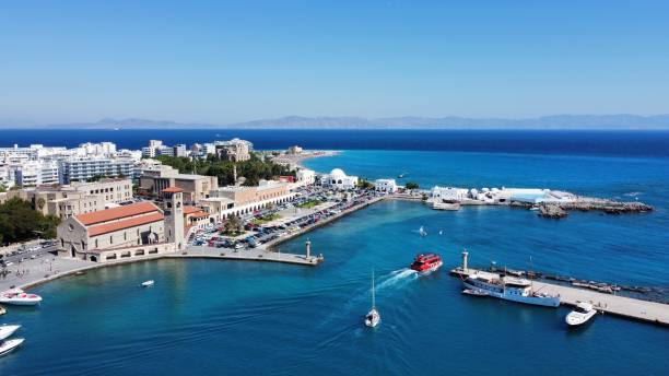 istock Drone image capturing ships leaving port of Rhodes 1425556904