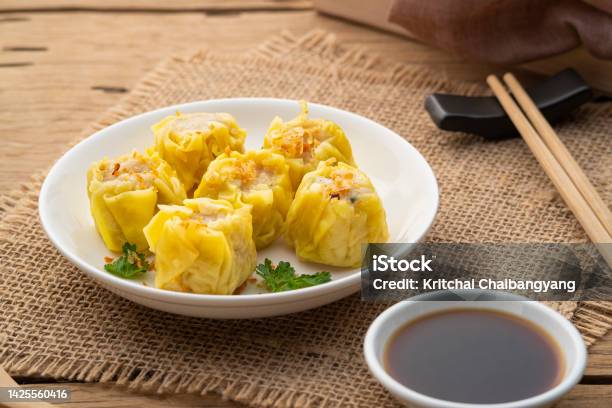 Shumai Or Chinese Steamed Dumplingmeatball Dumpling With Wanton Skin In With Plate Stock Photo - Download Image Now