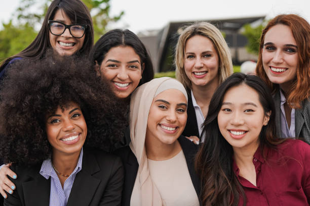 Multiethnic business women smiling on camera
