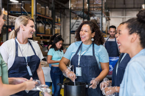 istock Friends work together at the volunteer event 1425562505